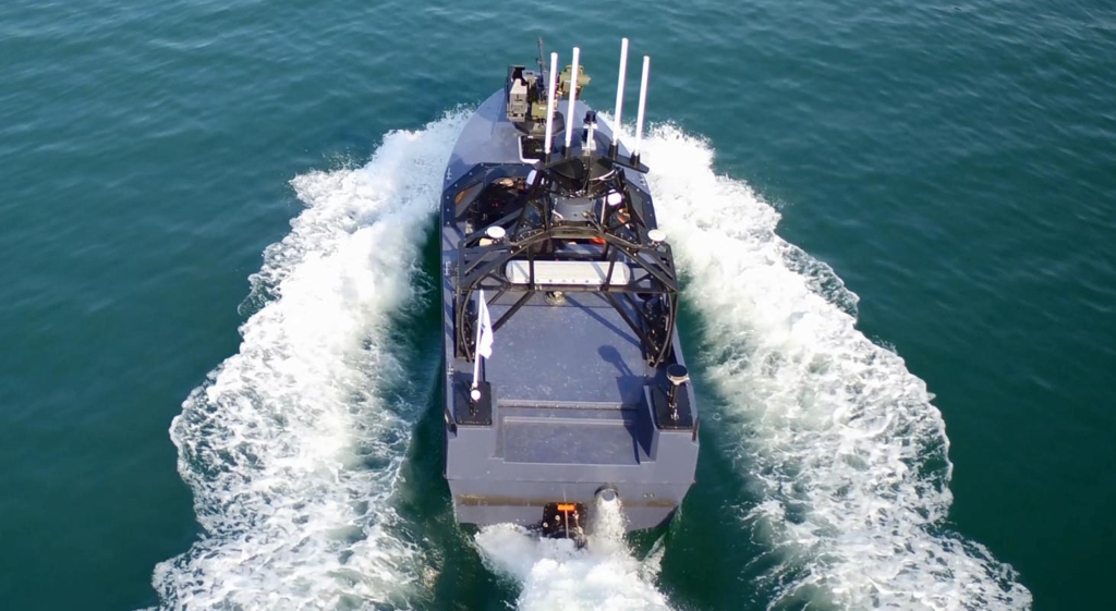 A newly developed unmanned surface vessel cuts through the water in this photo provided by the Defense Acquisition Program Agency. (Yonhap)