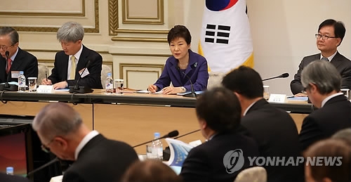 This file photo, taken on Dec. 2, 2014, shows then President Park Geun-hye presiding over the third meeting of the Presidential Committee for Unification Preparation at the presidential office Cheong Wa Dae in Seoul. (Yonhap) 