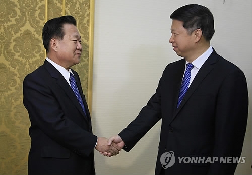 This photo, provided by The Associated Press on Nov. 17, 2017, shows Song Tao (R), a special envoy of Chinese President Xi Jinping, meeting with Choe Ryong-hae, a senior North Korean party official, in Pyongyang. (Yonhap)