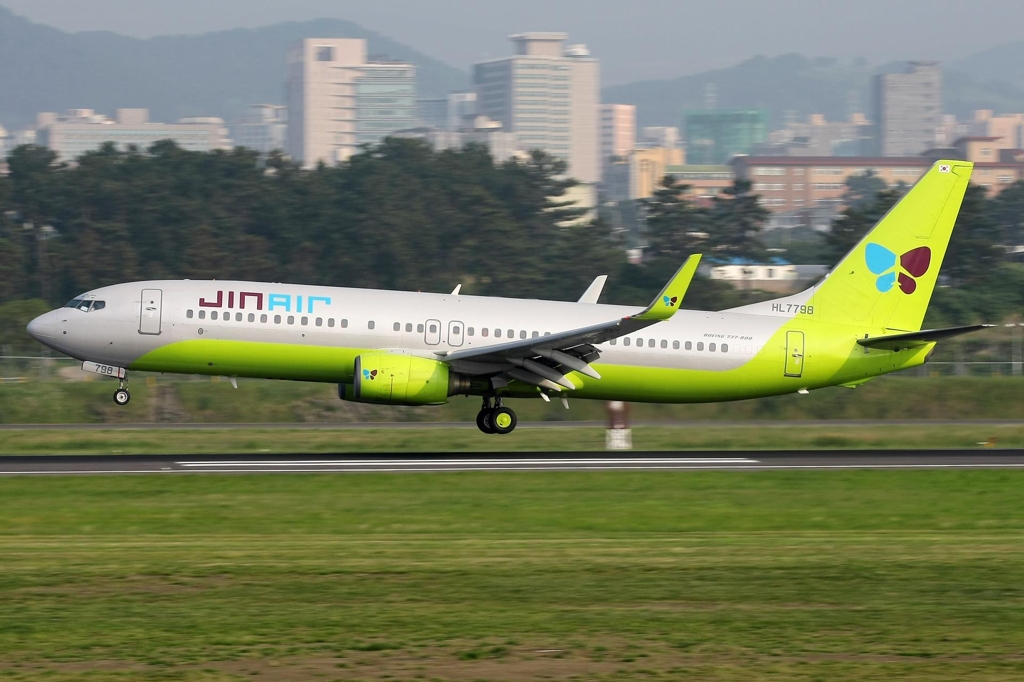 A Jin Air passenger jet lands at an airport in South Korea. (Yonhap)