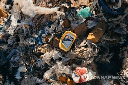 This undated photo, released by Greenpeace, shows the trash shipped from South Korea to the Philippines. (Yonhap)