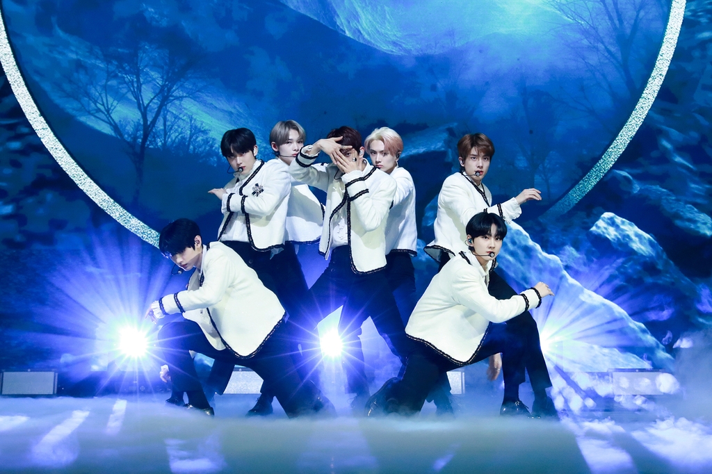 This photo, provided by Belift Lab, shows members of rookie boy band ENHYPEN performing lead track "Given-Taken" during a media showcase held online on Nov. 30, 2020. (PHOTO NOT FOR SALE) (Yonhap)