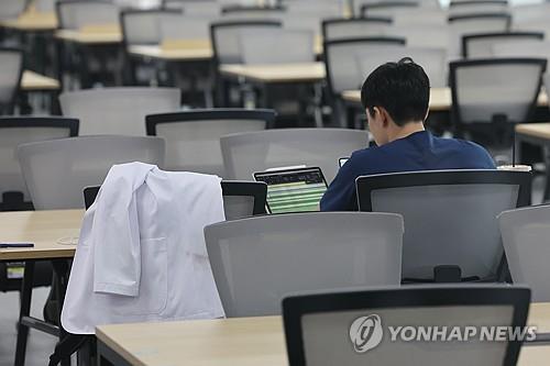 A medical school student sits in a school library in Seoul on May 17, 2024. (Yonhap)