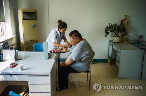 '살찌는 중국'…정크푸드 확산에 농촌 남아 5명 중 1명 비만 - 2