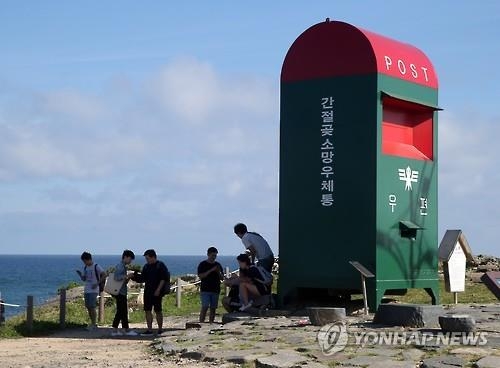 울산 간절곶서 피카츄 잡았다…'포켓몬 고' 열풍 - 6