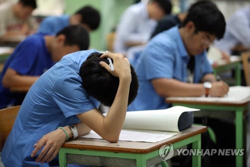 머리 싸매고