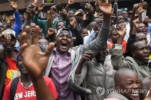 케냐 마라토너 킵초게 2시간 벽 허물다