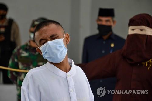 음주로 공개 태형 40대 선택한 기독교인 남성