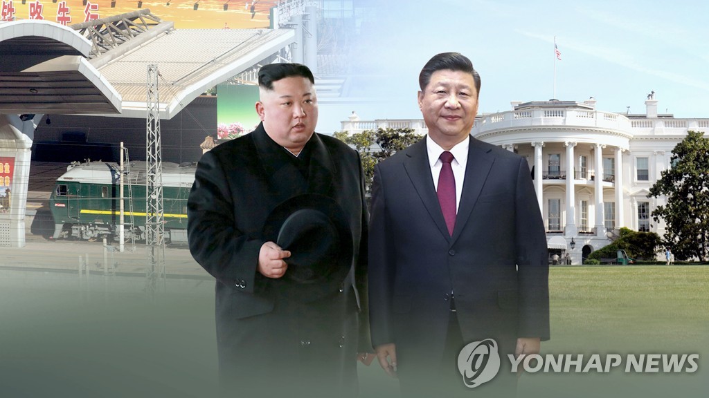 This image, provided by Yonhap News TV, shows Chinese President Xi Jinping (R) and North Korean leader Kim Jong-un. (Yonhap)