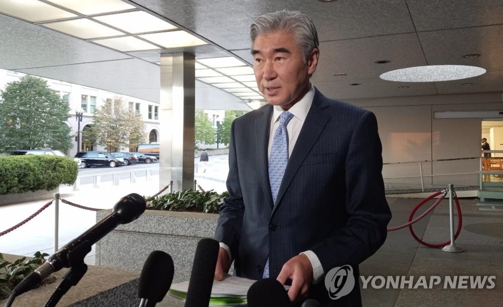 U.S. Special Representative for North Korea Policy Sung Kim speaks to reporters outside the U.S. State Department's office in Washington after his meeting with his South Korean counterpart, Noh Kyu-duk, on Oct. 19, 2021. (Yonhap)