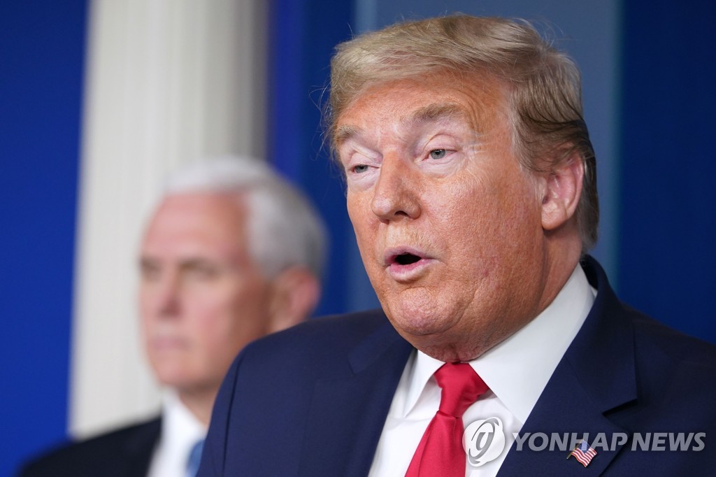 This AFP photo shows U.S. President Donald Trump speaking during the daily briefing on the novel coronavirus at the White House on March 24, 2020. (Yonhap)