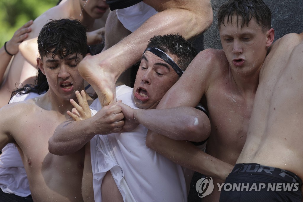 US-NAVAL-ACADEMY-HOLDS-ANNUAL-HERNDON-MONUMENT-CLIMB