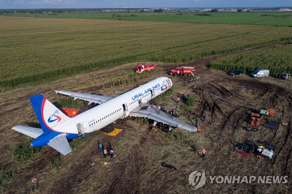 Dismantling Airbus A321 jet at crash landing site near Zhukovsky Airport
