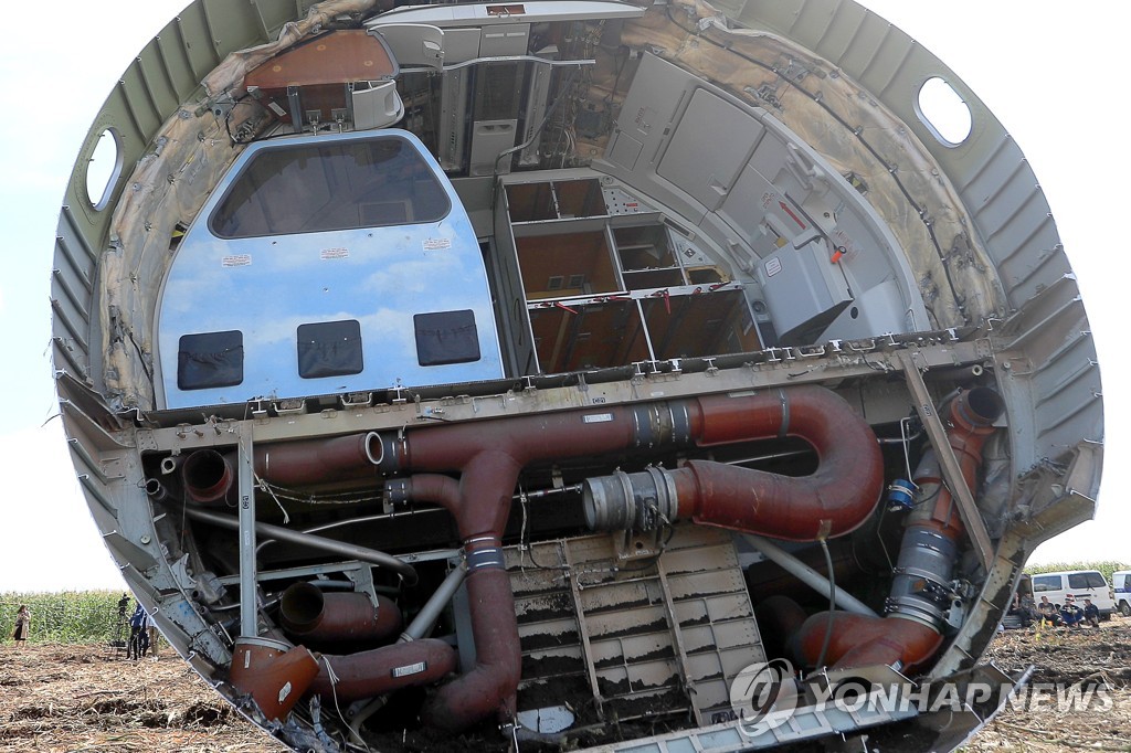 Dismantling Airbus A321 jet at crash landing site near Zhukovsky Airport