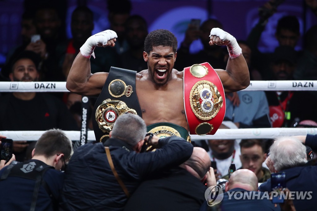 British boxer Anthony Joshua wins back his world heavyweight titles in Saudi Arabia
