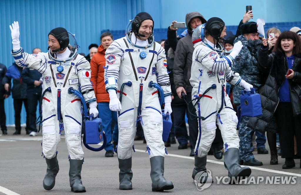 Soyuz MS-20 spacecraft crew before launch from Baikonur Cosmodrome