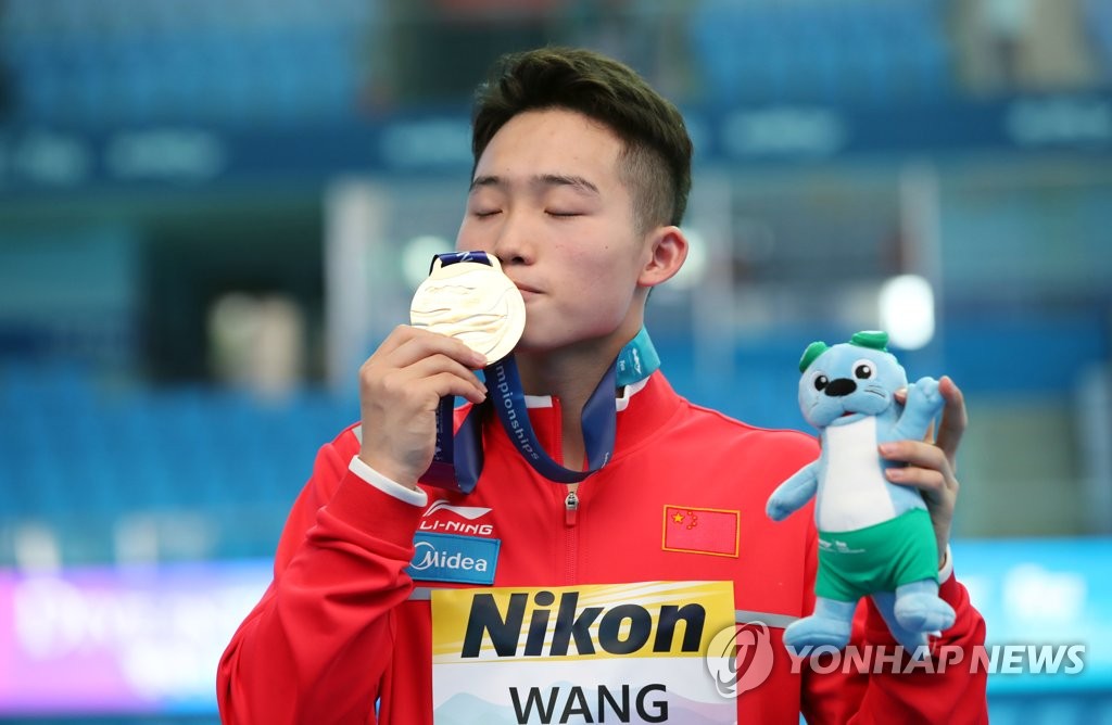 Winner of men's springboard diving Winner of men's springboard diving