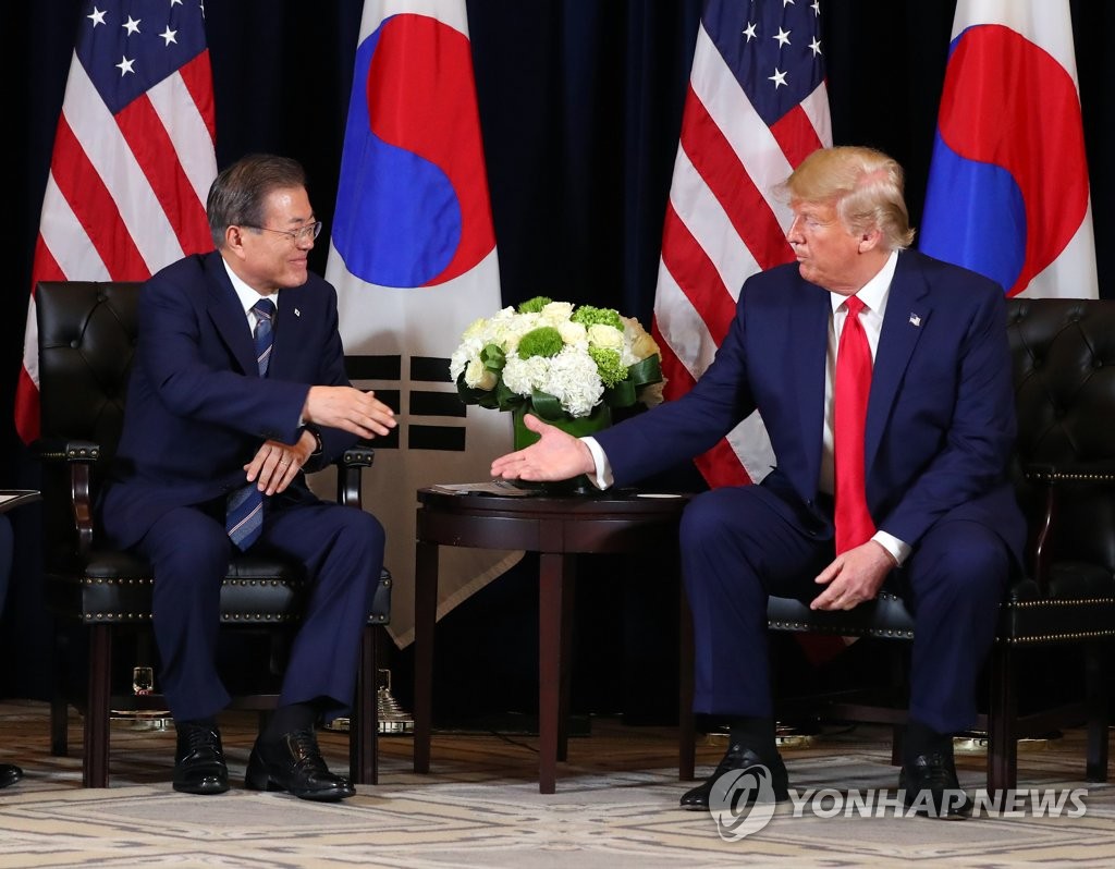 This file photo, dated Sept. 24, 2019, shows South Korean President Moon Jae-in (L) meeting with U.S. President Donald Trump in New York. (Yonhap)