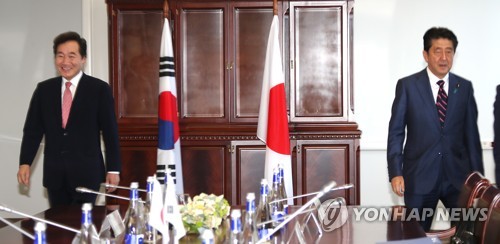 1년 전 아베 총리와 이낙연 총리
