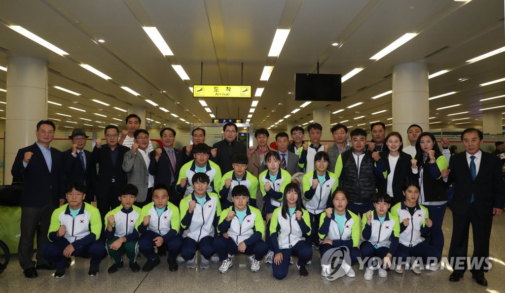 Weightlifters in Pyongyang Weightlifters in Pyongyang