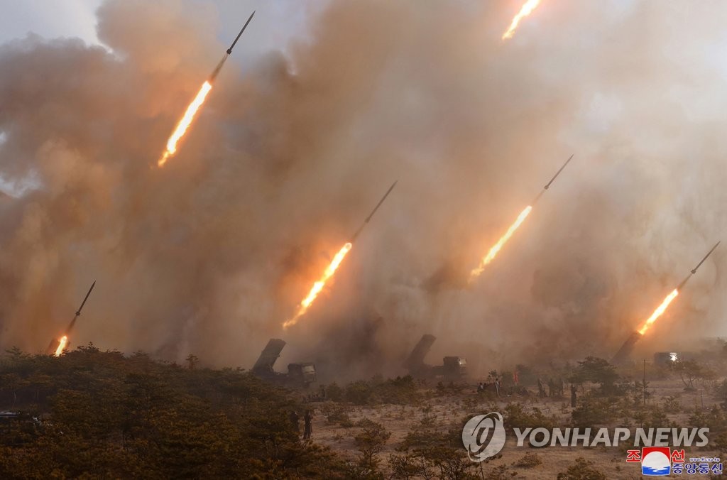 N.K. leader inspects long-range artillery drill N.K. leader inspects long-range artillery drill