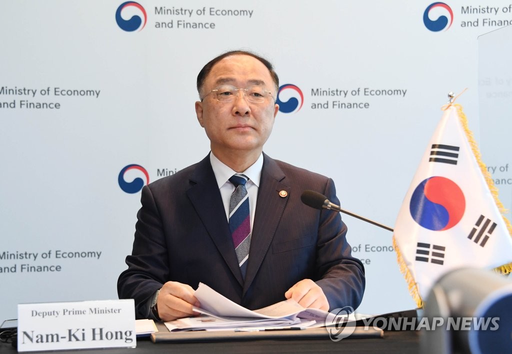 This photo, provided by the Ministry of Economy and Finance on May 3, 2021, shows South Korean Finance Minister Hong Nam-ki attending an online trilateral meeting of the financial chiefs of South Korea, China and Japan. (PHOTO NOT FOR SALE) (Yonhap)