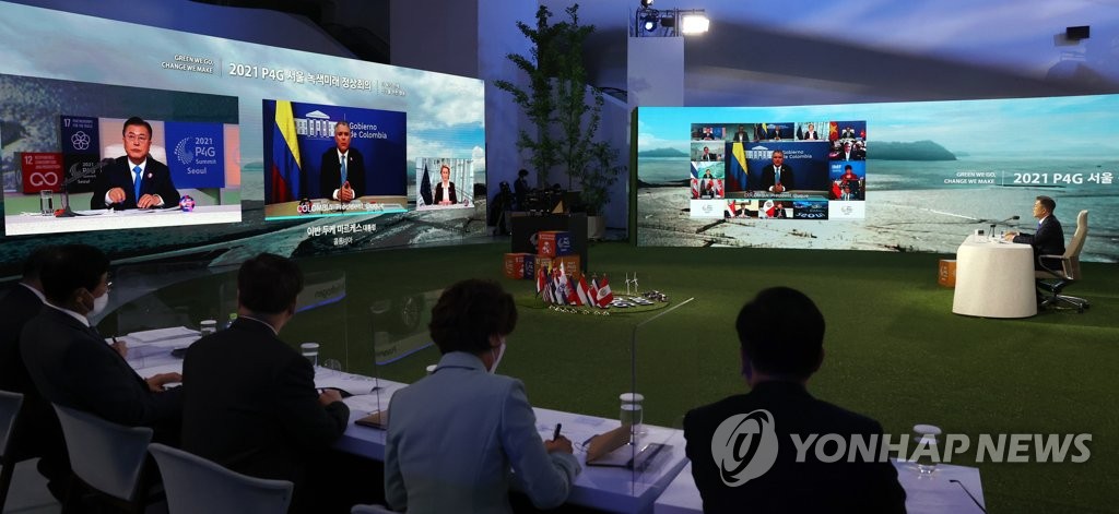 South Korean President Moon Jae-in chairs the Leaders' Dialogue session of the P4G Seoul Summit at Dongdaemun Design Plaza in Seoul on May 31, 2021. (Yonhap)