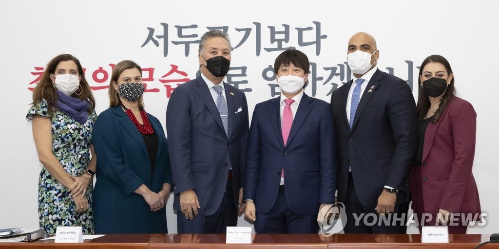 Ruling party's chief meets U.S. congressional group Ruling party's chief meets U.S. congressional group