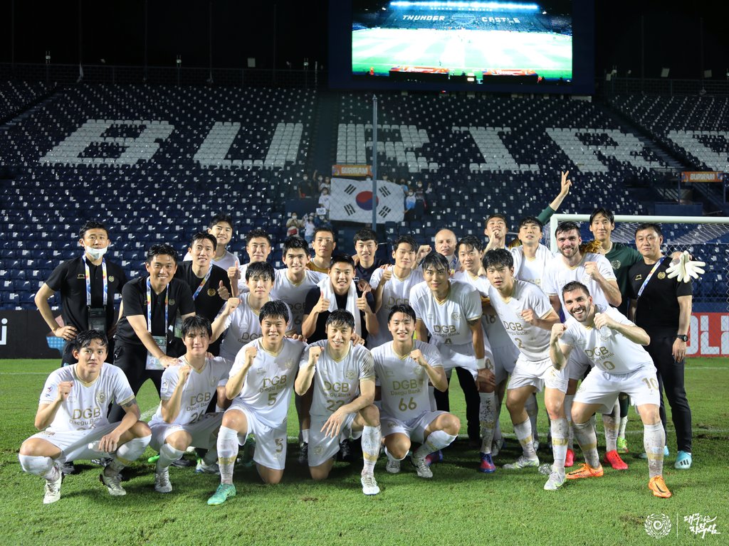 In this April 30, 2022, file photo provided by Daegu FC, players and coaches of Daegu FC celebrate their 2-1 victory over Lion City Sailors during the clubs' Group F match at the Asian Football Confederation Champions League at Buriram Stadium in Buriram, Thailand. (PHOTO NOT FOR SALE) (Yonhap)