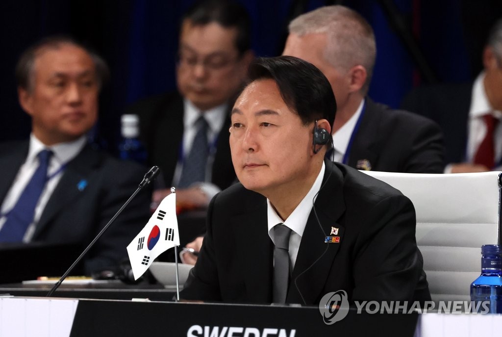 South Korean President Yoon Suk-yeol takes part in a summit of the North Atlantic Treaty Organization (NATO) at the IFEMA Convention Center in Madrid on June 29, 2022. Yoon and the leaders of Japan, Australia and New Zealand were invited to the NATO summit, as their nations are NATO partners. (Yonhap)