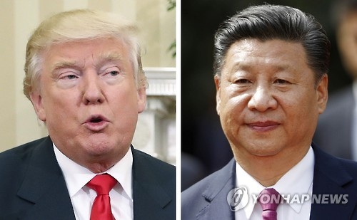 (LEAD) Trump agrees to honor 'one China' policy in 'extremely cordial' phone call with Xi: White House