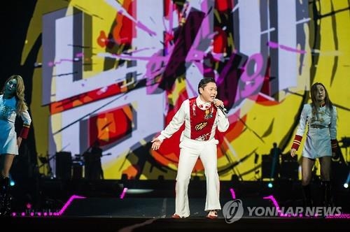 This file photo provided by YG Entertainment shows South Korean pop musician Psy performing at a concert in Seoul on Dec. 24, 2016. (Yonhap)