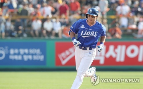 In this file photo taken on May 21, 2017, Samsung Lions' Lee Seung-yuop runs the bases after hitting a home run against the Hanwha Eagles in a KBO League game at Eagles Park in Daejeon. (Yonhap)