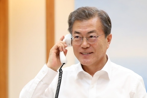 This photo provided courtesy of the presidential office, Cheong Wa Dae, shows South Korean President Moon Jae-in during his telephone conversation with U.S. President Donald Trump on Jan. 4, 2018. (Yonhap)