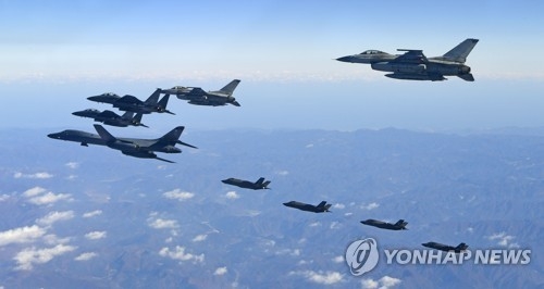 A B-1B Lancer strategic bomber, two F-35A and two F-35B stealth jets of the U.S. and two F-16K and two F-15K fighters of South Korea fly in formation over the Korean Peninsula in this year's annual joint South Korea-U.S. air force drill, Vigilant Ace, on Dec. 6, 2017, in this photo provided by the air force. The exercise against North Korean provocations was the biggest in its history. (Yonhap)