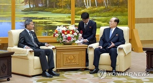 Kim Yong-nam (R), president of the Presidium of North Korea's Supreme People's Assembly, meets with Singapore's Foreign Minister Vivian Balakrishnan in Pyongyang on June 8, 2018, in this photo released by North Korea's official Korean Central News Agency. (For Use Only in the Republic of Korea. No Redistribution) (Yonhap)