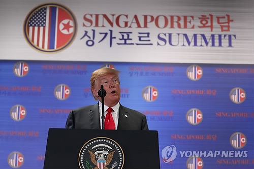 This Reuters photo shows U.S. President Donald Trump speaking during a press conference at the Capella Hotel on Sentosa Island, Singapore, on June 12, 2018. (Yonhap)