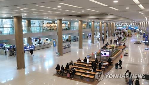 An arrivals lounge is quiet at Incheon International Airport, west of Seoul, on Feb. 11, 2020, amid the new coronavirus crisis. (Yonhap)