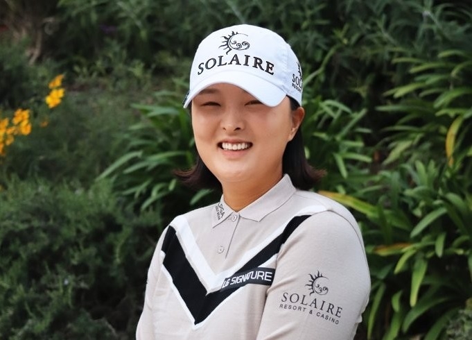 This photo provided by SEMA Sports Marketing shows Ko Ji-young, world No. 1 in women's golf, wearing the logo of her new corporate sponsor, Solaire Resort & Casino. (PHOTO NOT FOR SALE) (Yonhap)