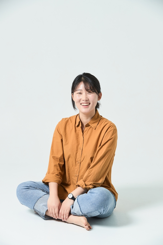 Son Ja-young smiles at the camera, in this undated photo provided by her and The Beautiful Foundation. (PHOTO NOT FOR SALE) (Yonhap)