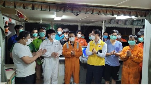 This photo provided by Seoul's foreign ministry on Feb. 4, 2021, shows officials from the South Korean Embassy in Iran meeting with the crew members detained aboard the Korean-flagged MT Hankuk Chemi oil tanker the previous day, after Tehran said it will allow the sailors, except for the captain, to leave the ship it seized last month over alleged ocean pollution. It remains unclear how many of them expressed a desire to leave the ship. (PHOTO NOT FOR SALE) (Yonhap) 