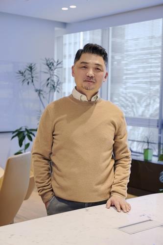 This undated image, provided by South Korea's top mobile messenger operator Kakao Corp., shows the company's founder, Kim Beom-su. (PHOTO NOT FOR SALE) (Yonhap)