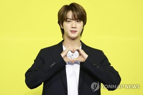 BTS member Jin poses during a news conference for the group's new digital single "Butter" in eastern Seoul on May 21, 2021. (Yonhap)