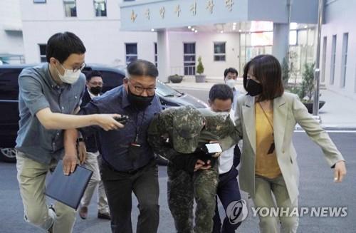 An Air Force officer is taken to a military court in Seoul on June 2, 2021, to attend a hearing to review whether a arrest warrant will be issued over his alleged sexual harassment of a female colleague, which caused her to take her own life in May, in this photo provided by the defense ministry. (PHOTO NOT FOR SALE) (Yonhap)