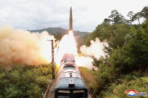 This photo, released by North Korea's official Korean Central News Agency (KCNA) on Sept. 16, 2021, shows a railway-borne missile regiment holding a firing drill a day earlier. (For Use Only in the Republic of Korea. No Redistribution) (Yonhap)
