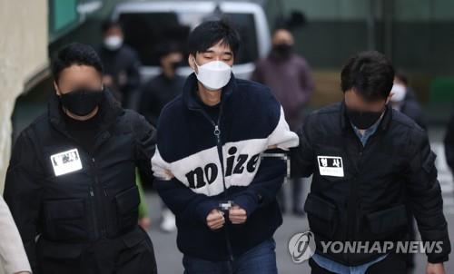 Kim Byung-chan leaves Seoul Namdaemun Police Station to be transported to the Seoul Central District Prosecutors Office on Nov. 29, 2021. (Yonhap) 