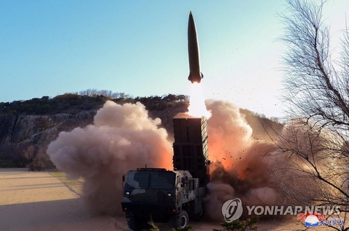 (LEAD) N. Korean leader inspects test-firing of new tactical guided weapon