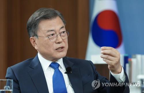 President Moon Jae-in speaks during an interview with the broadcaster JTBC in this file photo released by the presidential office. (PHOTO NOT FOR SALE) (Yonhap)