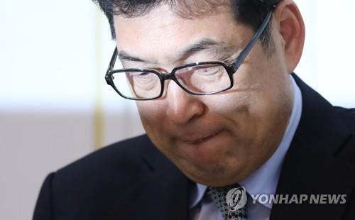 Jun Myung-kyu, a former speed skating coach, appears at a press conference on Jan. 21, 2019, to respond to allegations of involvement in sexual assault cases involving athletes and a coach. (Yonhap) 