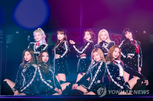 K-pop girl group TWICE is seen in this photo provided by JYP Entertainment. (PHOTO NOT FOR SALE) (Yonhap)